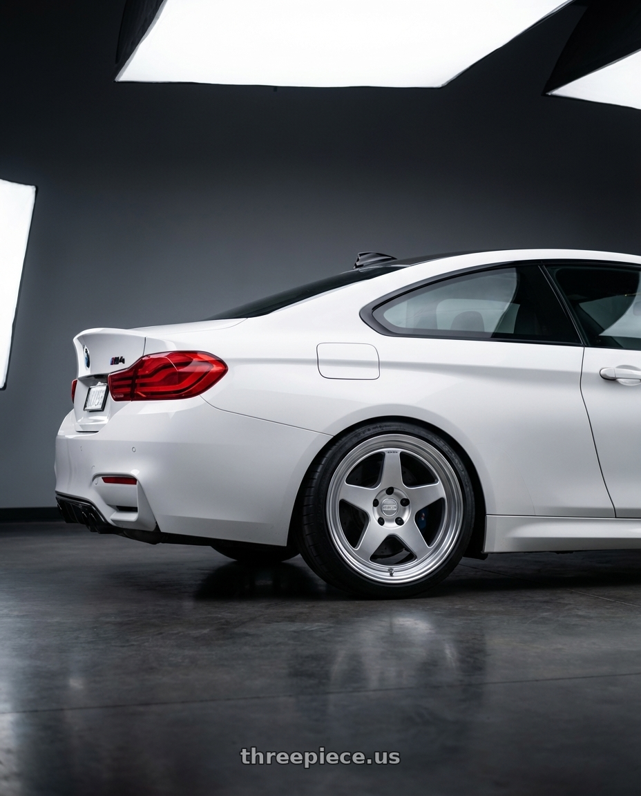 2018 BMW M4 F82 with Kansei K12H KNP 5X120 19x9.5 22 Hyper Silver wheels rear three quarter view square tires