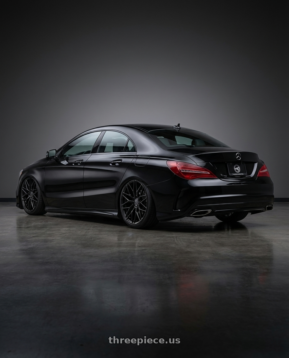 2018 Mercedes-Benz CLA C117 with Avant Garde Wheels M520R 5X112 19x8.5 +35 Gloss Black wheels rear three quarter view slight stretch tires