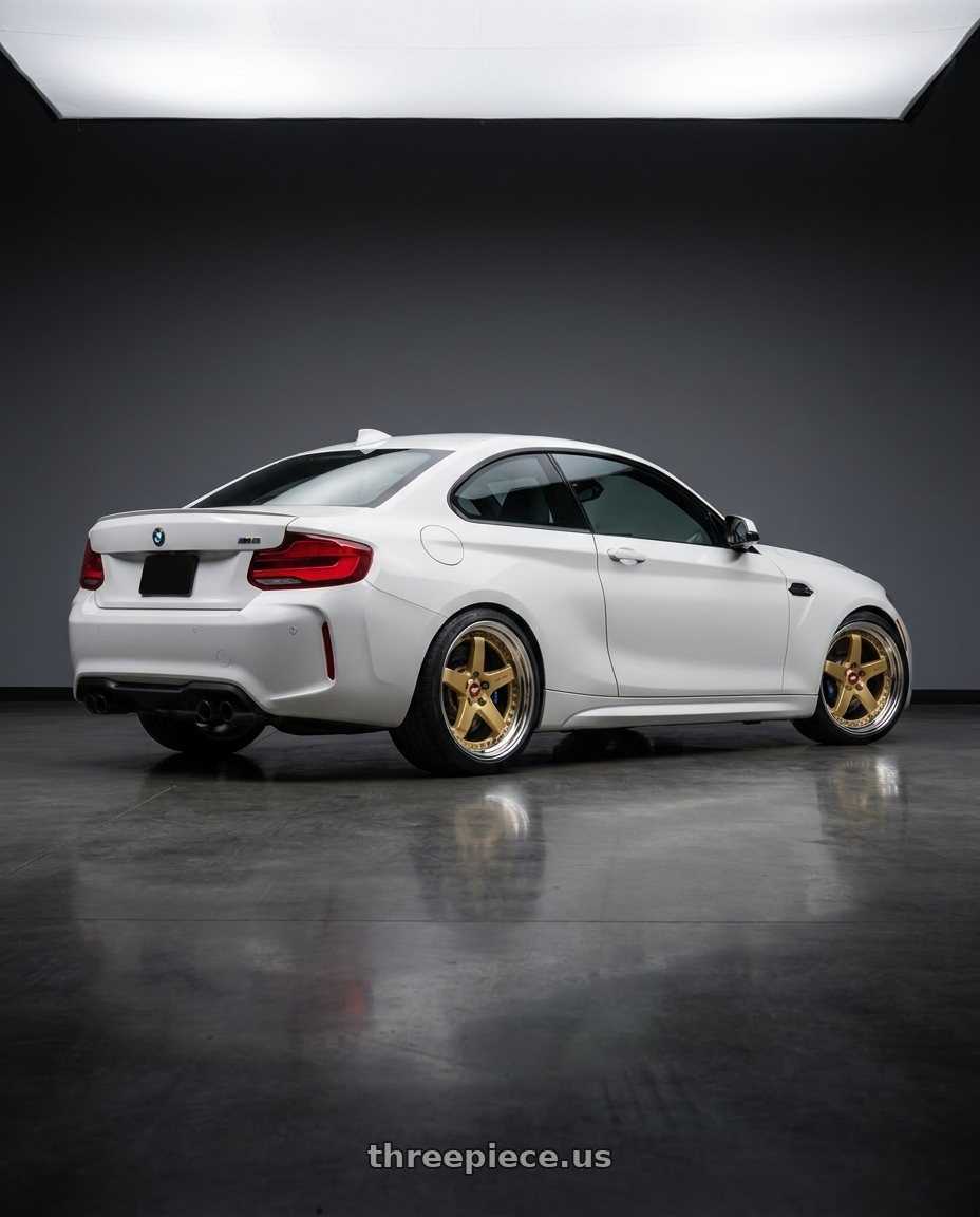 2018 bmw m2 with Work Zistance W5s 5x120 19x9.5+24 r disk Gold wheels rear three quarter view square tires