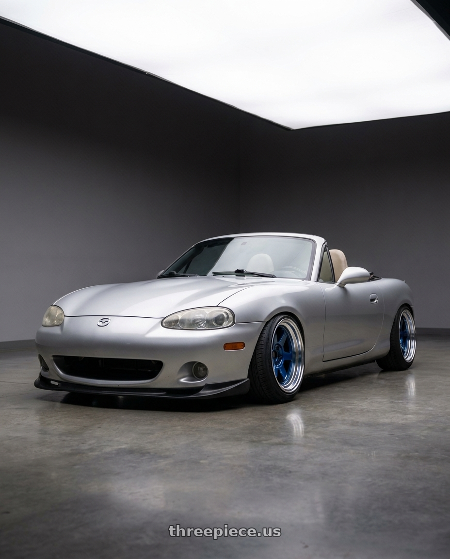 2000 Mazda Miata with Volk Racing TE37V 5x114.3 17x9.5 +15 MAG BLUE wheels