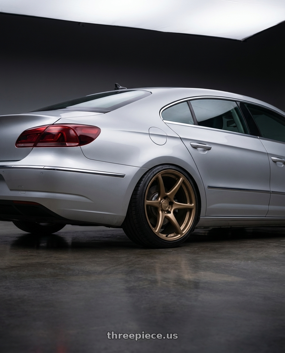 2015 Volkswagen CC with Kansei K11B Tandem 5X112 19x10.5 22 Bronze wheels rear three quarter view square tires