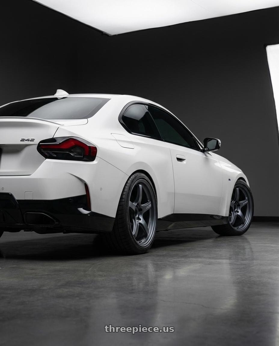 2024 BMW 2 Series G42 with Gram Lights 57CR 5x112 19x9.5+25 Gunblue II wheels rear three quarter view square tires