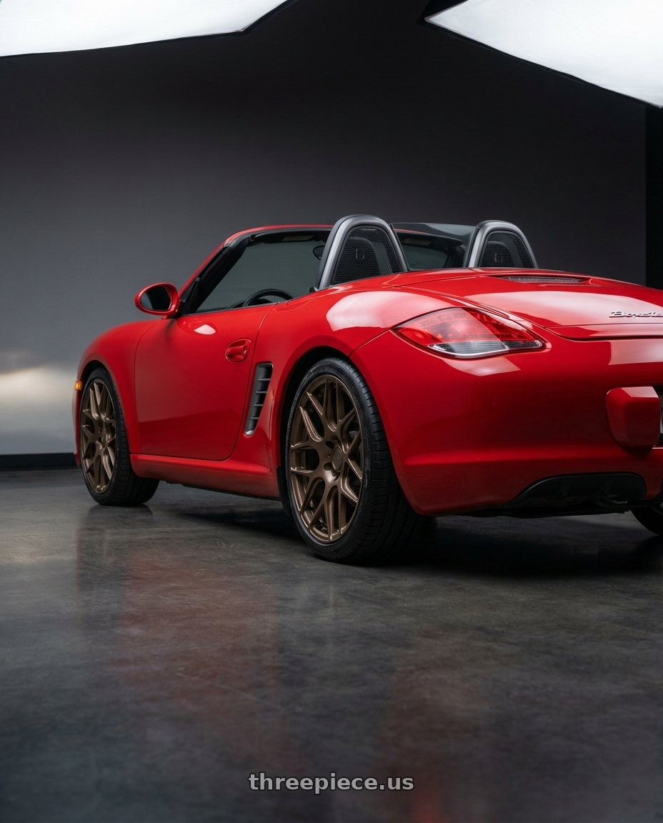 2009 Porsche Boxster S with MRR FS1 5x130 18x8.5  +45 Gloss Bronze wheels rear three quarter view square tires