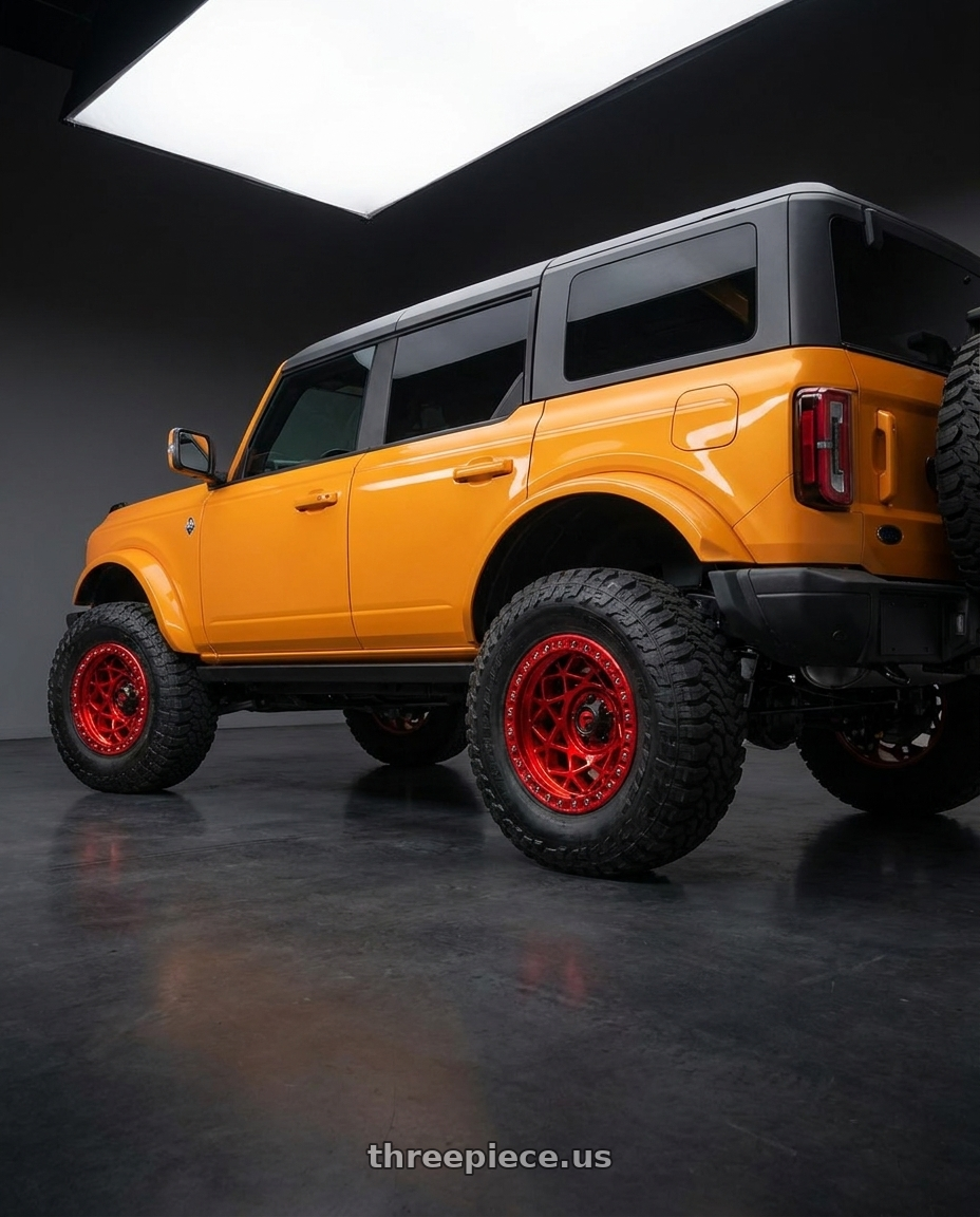 2024 Ford Bronco with Fuel 1PC D121 UNIT BEADLOCK 6X139.7 17X9 -15 CANDY RED wheels rear three quarter view meaty tires