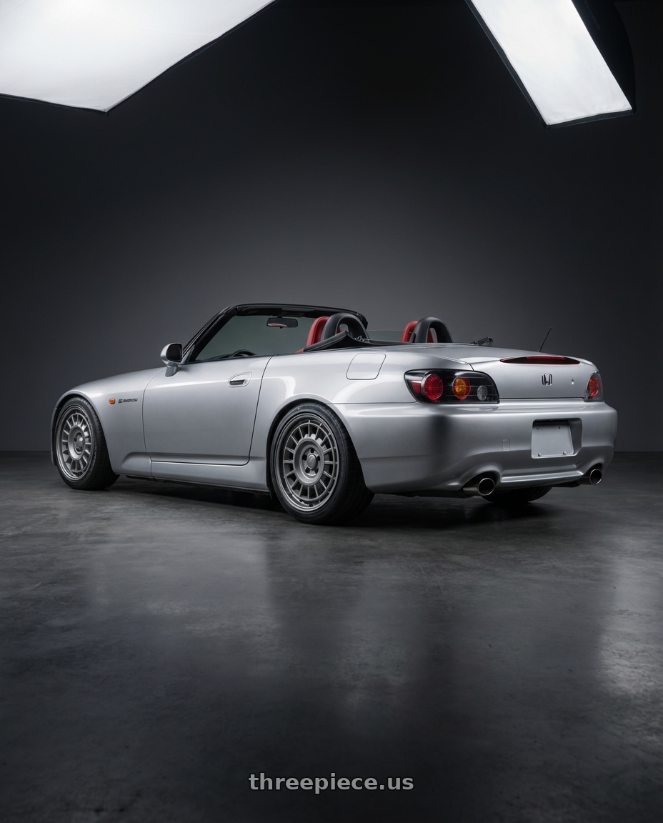 2009 Honda S2000 with fifteen52 ALPEN MX 5x114.3 17x8 +38 FROSTED GRAPHITE (SATIN GREY) wheels rear three quarter view square tires