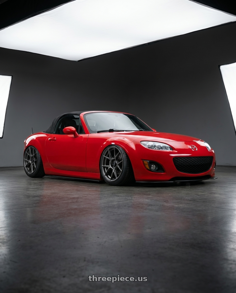 2012 Mazda MX-5 Miata NC with Konig Ampliform 5x114.3 17x8+40 Dark Metallic Graphite wheels