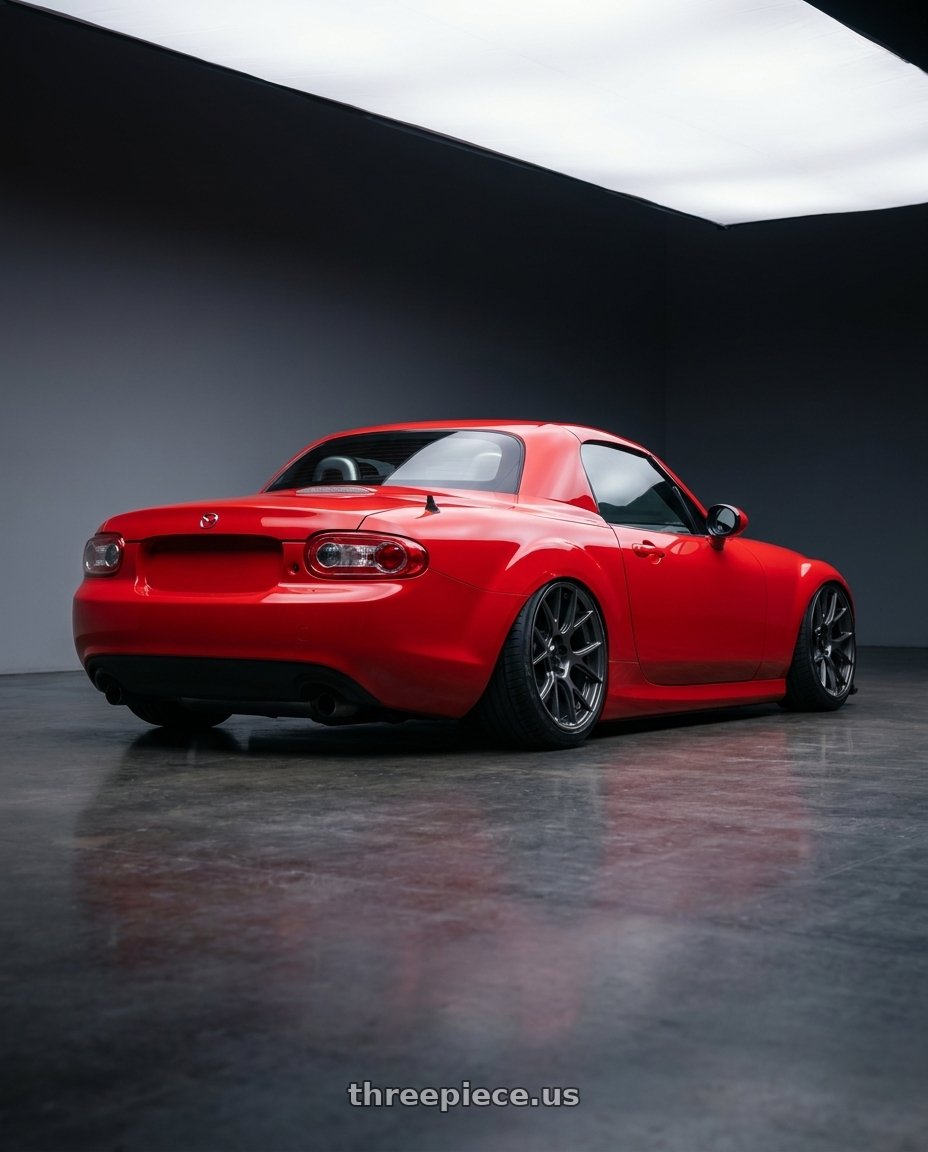 2012 Mazda MX-5 Miata NC with Konig Ampliform 5x114.3 17x8+40 Dark Metallic Graphite wheels rear three quarter view slight stretch tires