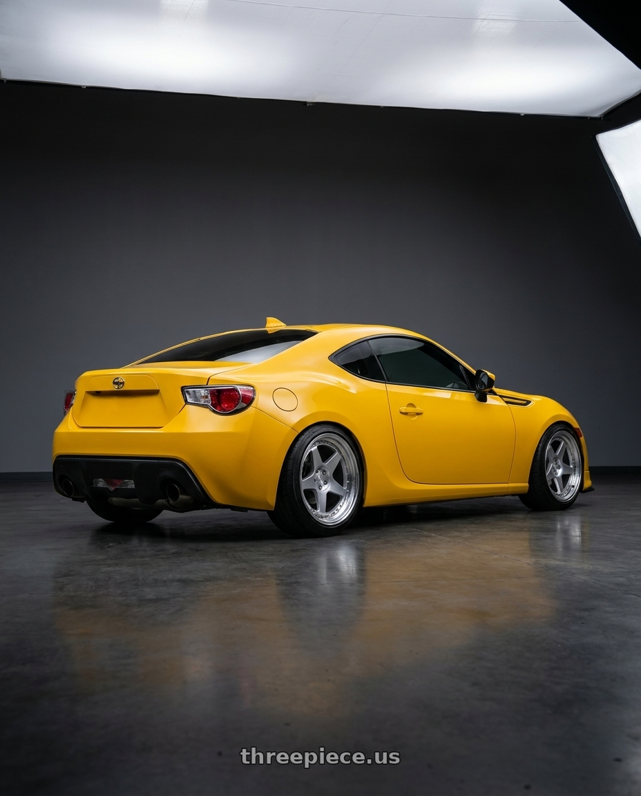 2015 scion frs with Aodhan DS08 5x100 18x9.5+35 Silver w/Machined Face wheels rear three quarter view slight stretch tires
