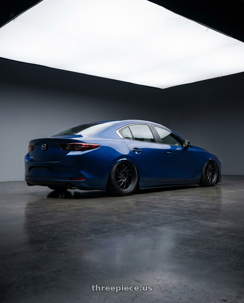 2022 Mazda mazda3 p with Enkei Cyclone 6x135 18x9+12 Matte Black wheels rear three quarter view slight stretch tires