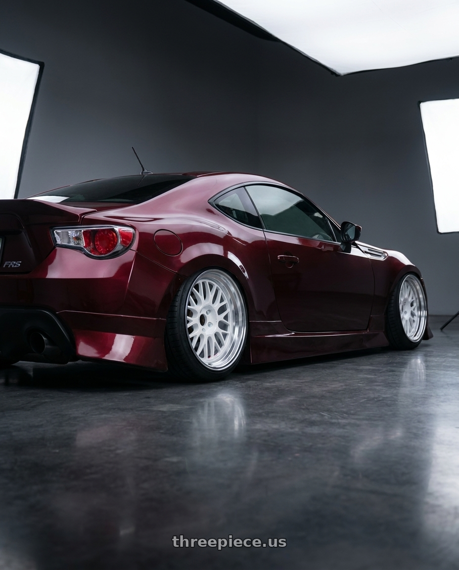 2013 scion FRS with Volk Racing 21A 5x112 18x10.5 +30 DASH WHITE/ DC wheels rear three quarter view slight stretch tires