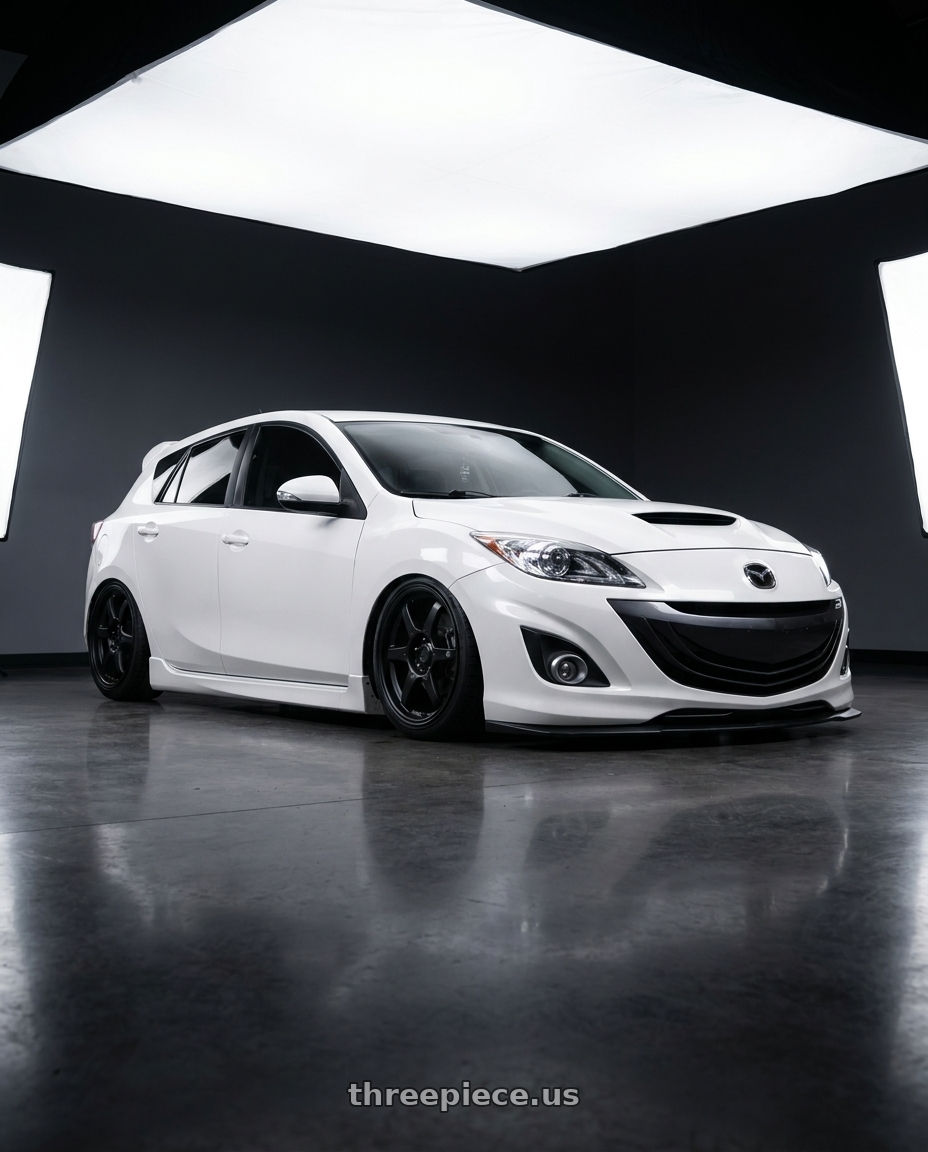 2012 Mazda Mazdaspeed3 with Konig Backbone 5x114.3 18x8+35 Matte Black Milling Logo on Spoke wheels