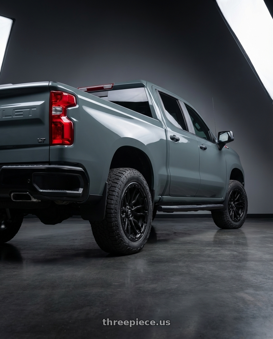 2026 chevrolet silverado lt trailboss cypress grey with Fuel 1PC D679 REBEL 6X139.7 18X9 +20 MATTE BLACK wheels rear three quarter view square tires