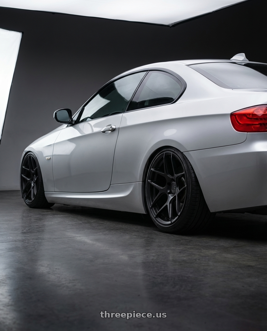 2012 BMW 3 Series E92 with Aodhan AFF2 5x120 19x9.5+35 Matte Black wheels rear three quarter view slight stretch tires