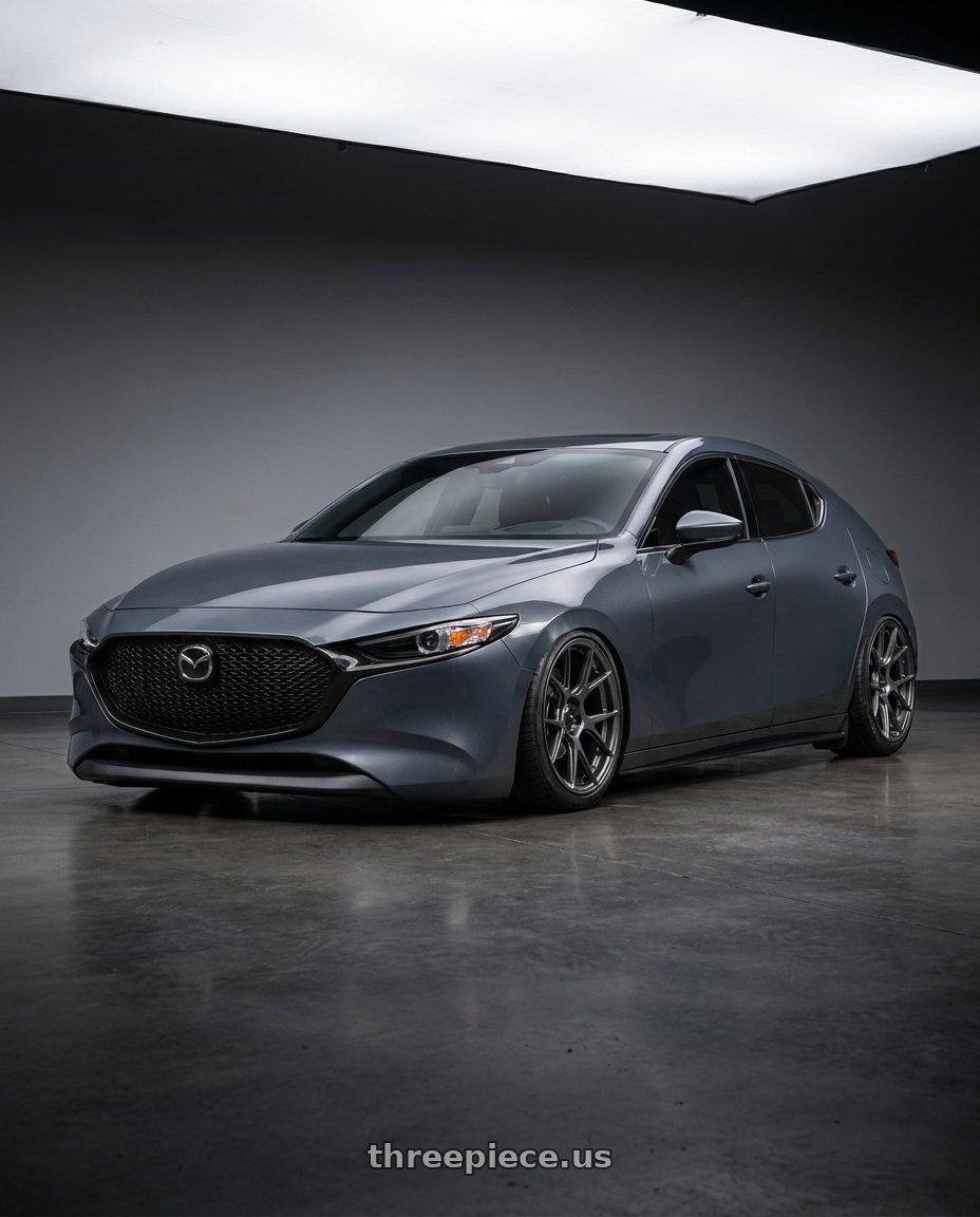 2023 Mazda 3 hatchback premium with Konig Ampliform 5x114.3 18x9.5+25 Dark Metallic Graphite wheels