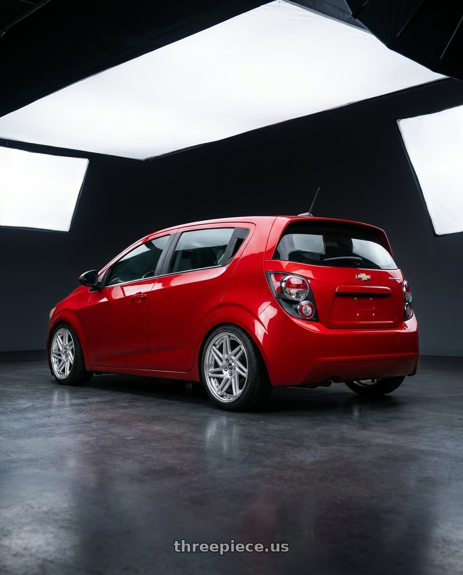 2014 Chevy Sonic Hatch with Work Zeast st3 5x100 20x8+45 A Disk Brush Silver Clear wheels rear three quarter view slight stretch tires