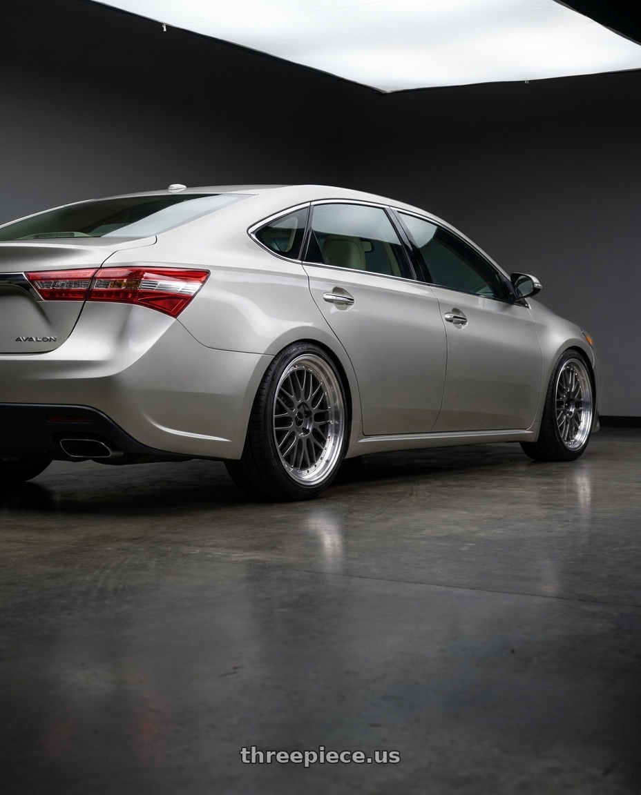 2013 toyota avalon with Vors VR8 5x114.3 18x9  +35 Hyper Black Machine Lip Chrome Rivet wheels rear three quarter view slight stretch tires