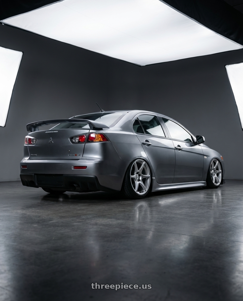 2014 Mitsubishi Lancer Ralliart with Kansei K11S Tandem 5x114.3 18x10.5 12 Hyper Silver wheels rear three quarter view slight stretch tires