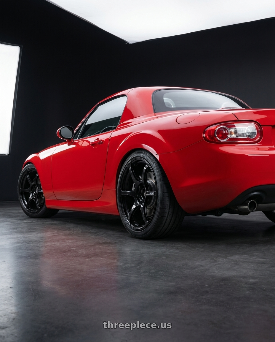 2012 Mazda MX-5 Miata NC with Advan RGIII 5x114.3 17x8.0+45 Gloss Black wheels rear three quarter view square tires
