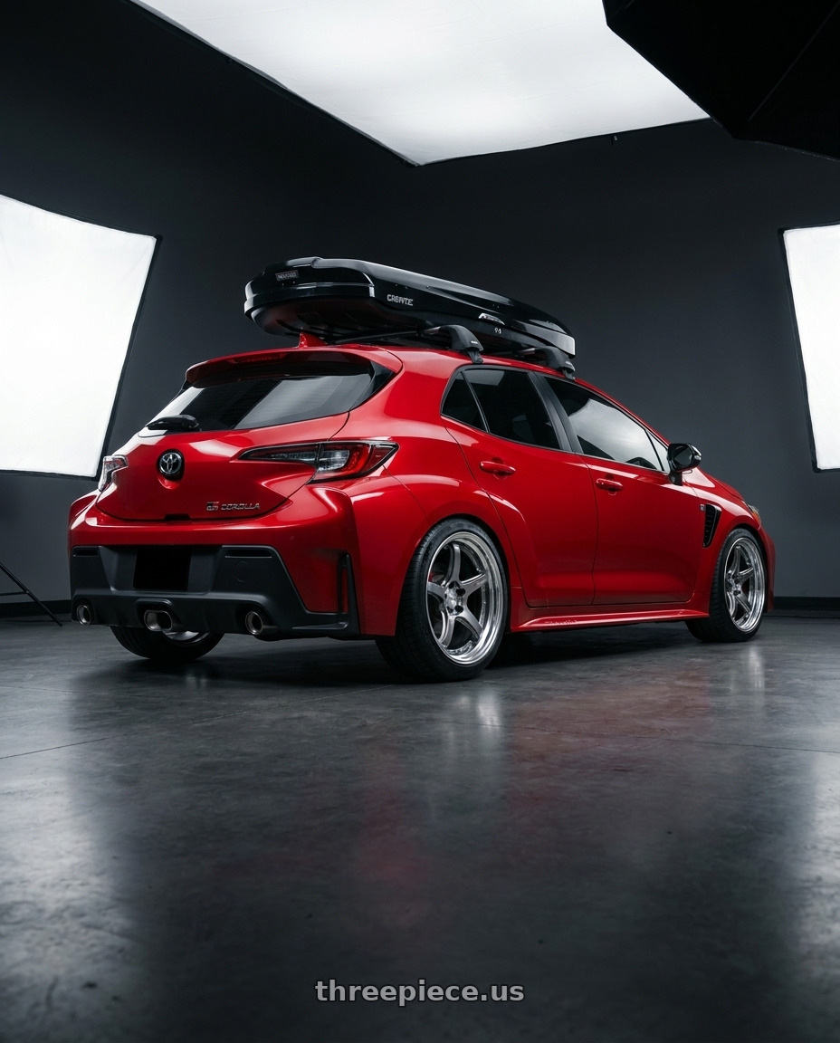 2026 Toyota GR Corola with Work T5R 2P 5x114.3 18x9.0 +22 GT SILVER wheels rear three quarter view square tires