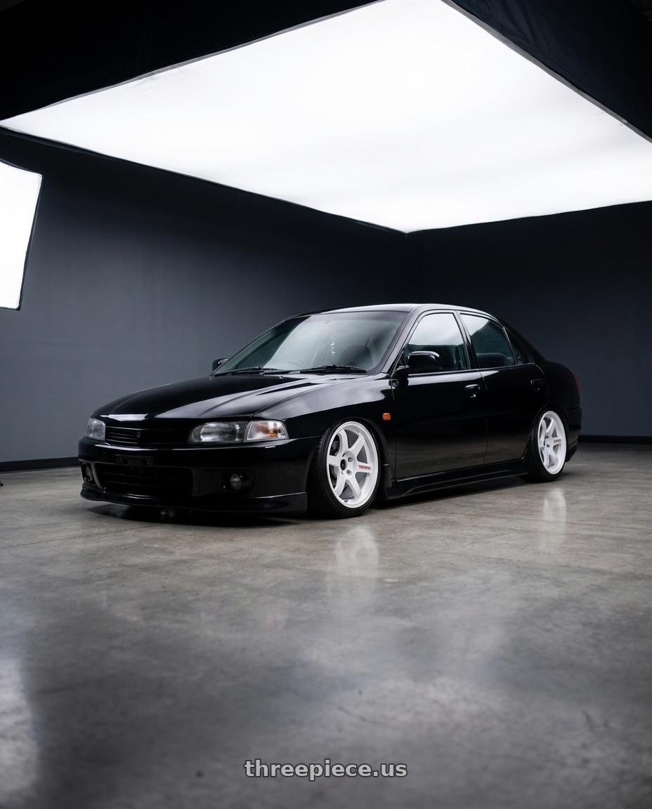 1996 Mitsubishi Lancer base with Volk Racing TE37 SAGA SL 5x114.3 18x9.5 +35 DASH WHITE wheels