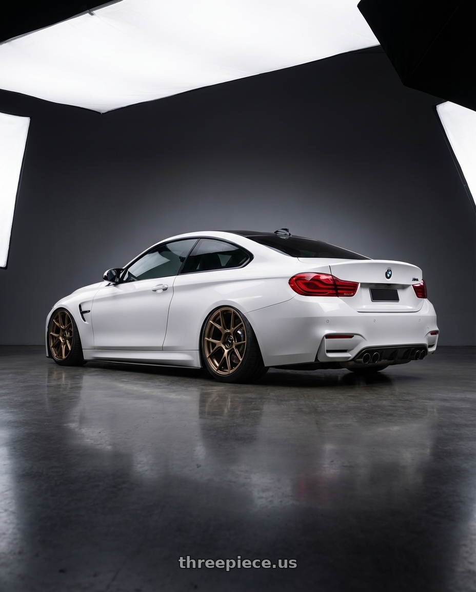 2018 BMW M4 F82 with Konig Ampliform 5x120 19x8.5+32 Gloss Bronze wheels rear three quarter view slight stretch tires