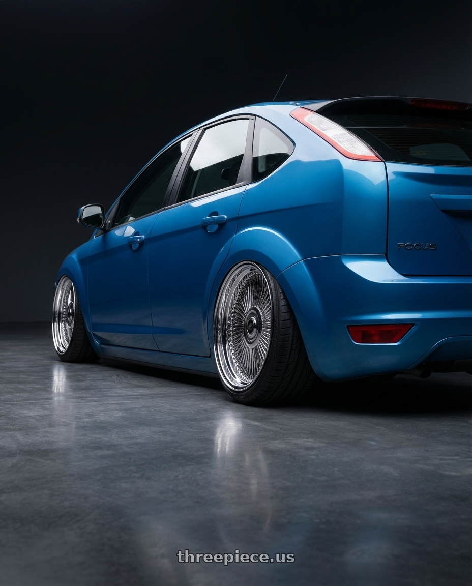 Ford Focus 2009 Zetec S  with Amani AMA-603 5x120/5x127 26x10 +5 Chrome wheels rear three quarter view extreme stretch tires