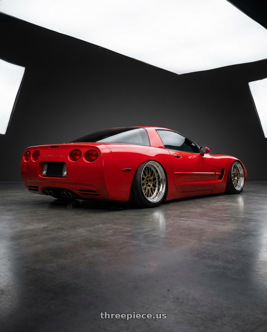 2001 red Chevy corvette base with Work Meister M1 3p 5x120.65 19x12.5-90 T Disk Titanium Gold wheels rear three quarter view square tires