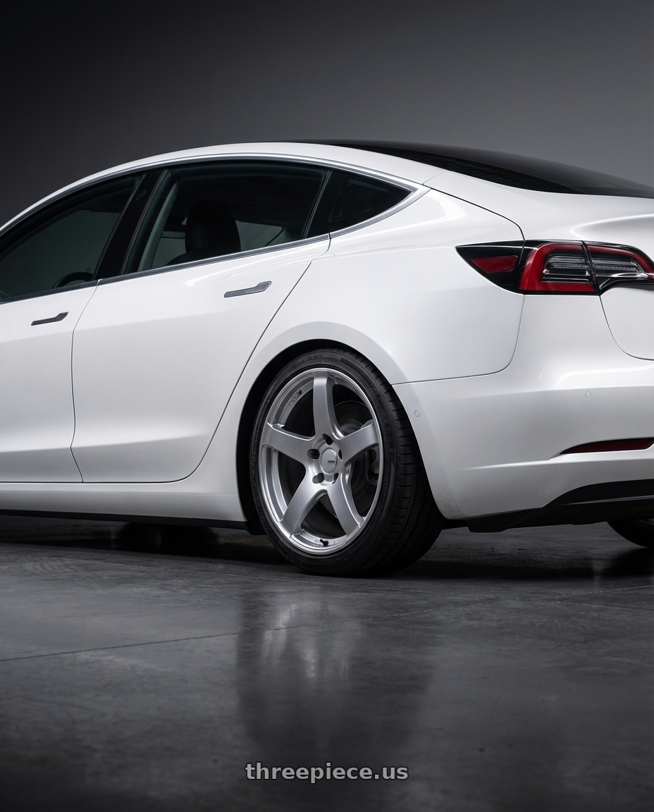 2023 Tesla Model 3 with Ssr Gtv01 5x114.3 19x8.5+38  GLARE SILVER wheels rear three quarter view square tires