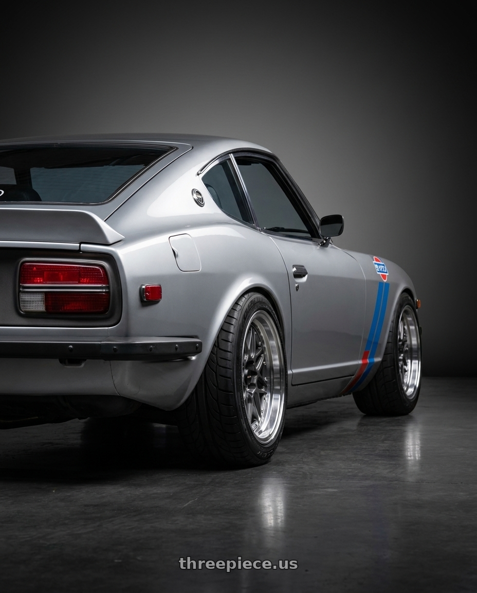 datsun 260Z 1974 with Vors VR7 4x100/4x114.3 16x8  +20 Gun Metal Machine Lip Chrome Rivet wheels rear three quarter view meaty tires