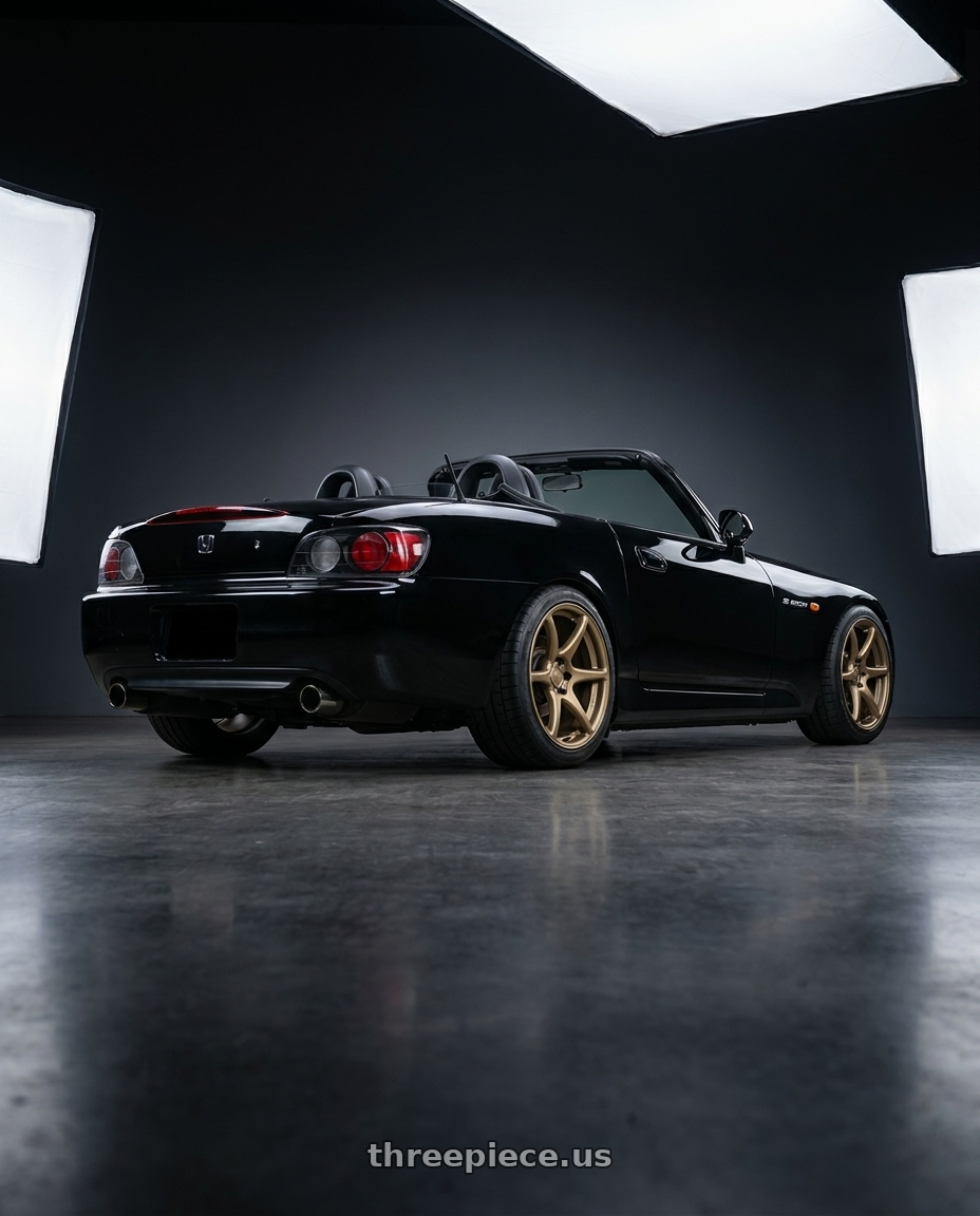 2004 Honda S2000 with Kansei K11B Tandem 5x114.3 18x8.5 35 Bronze wheels rear three quarter view square tires