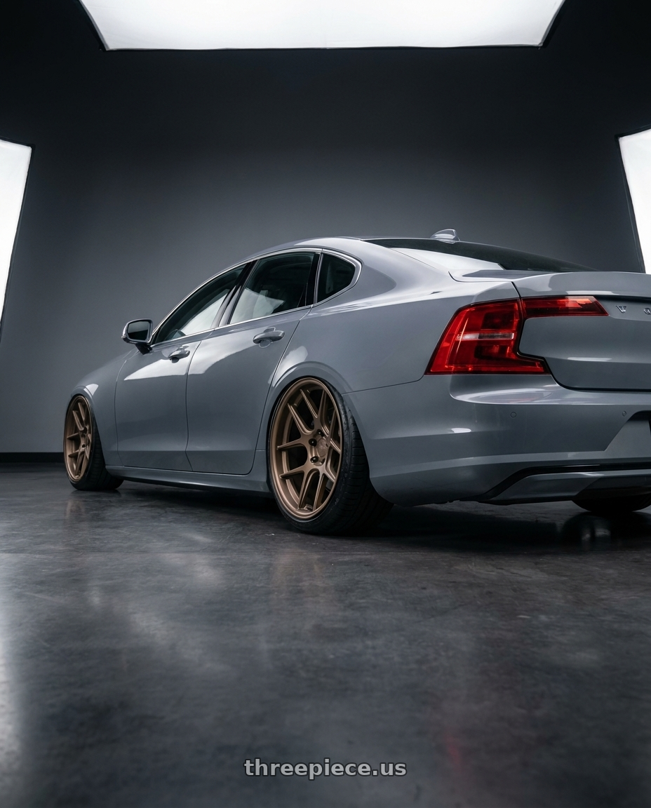2020 Volvo S90 with MRR FS6 5x108 19x10  +35 Matte Bronze wheels rear three quarter view slight stretch tires