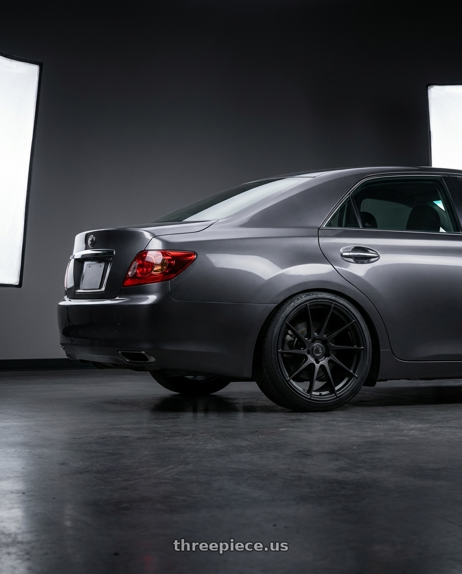 2008 Toyota Mark X with Aodhan AH09 5x108 18x8.5 +35 Matte Black wheels rear three quarter view square tires