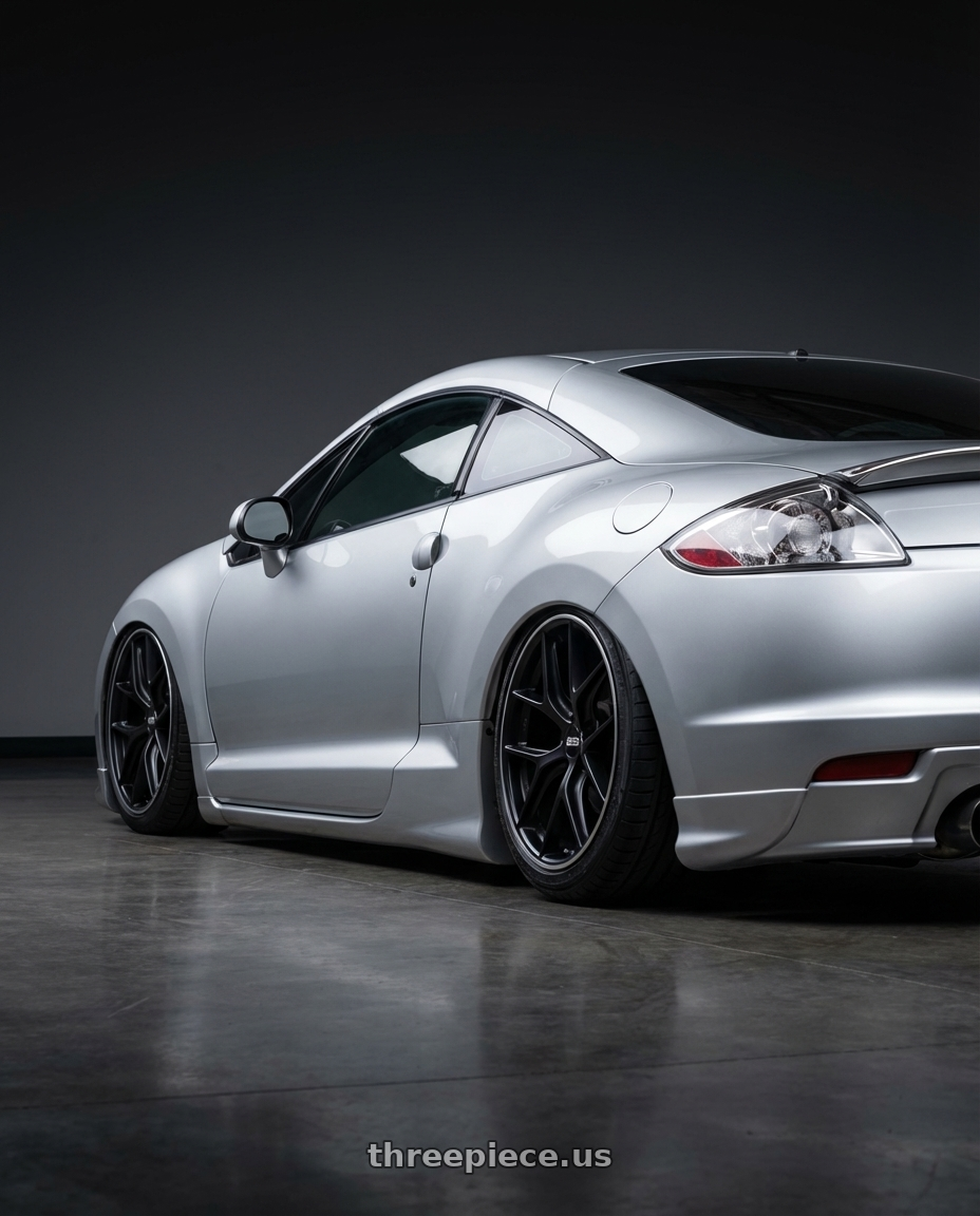 2010 Mitsubishi Eclipse with BBS CC-R 5x114.3 19x8.5+30 Satin Black wheels rear three quarter view slight stretch tires