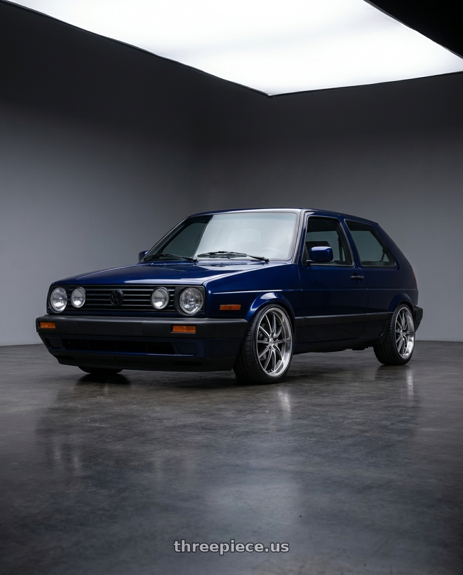 1990 vw golf mk2 hatchback , dark blue with Mandrus ARGENT 5X112 17X8 +42 GLOSS GUNMETAL W/ MIRROR CUT FACE wheels