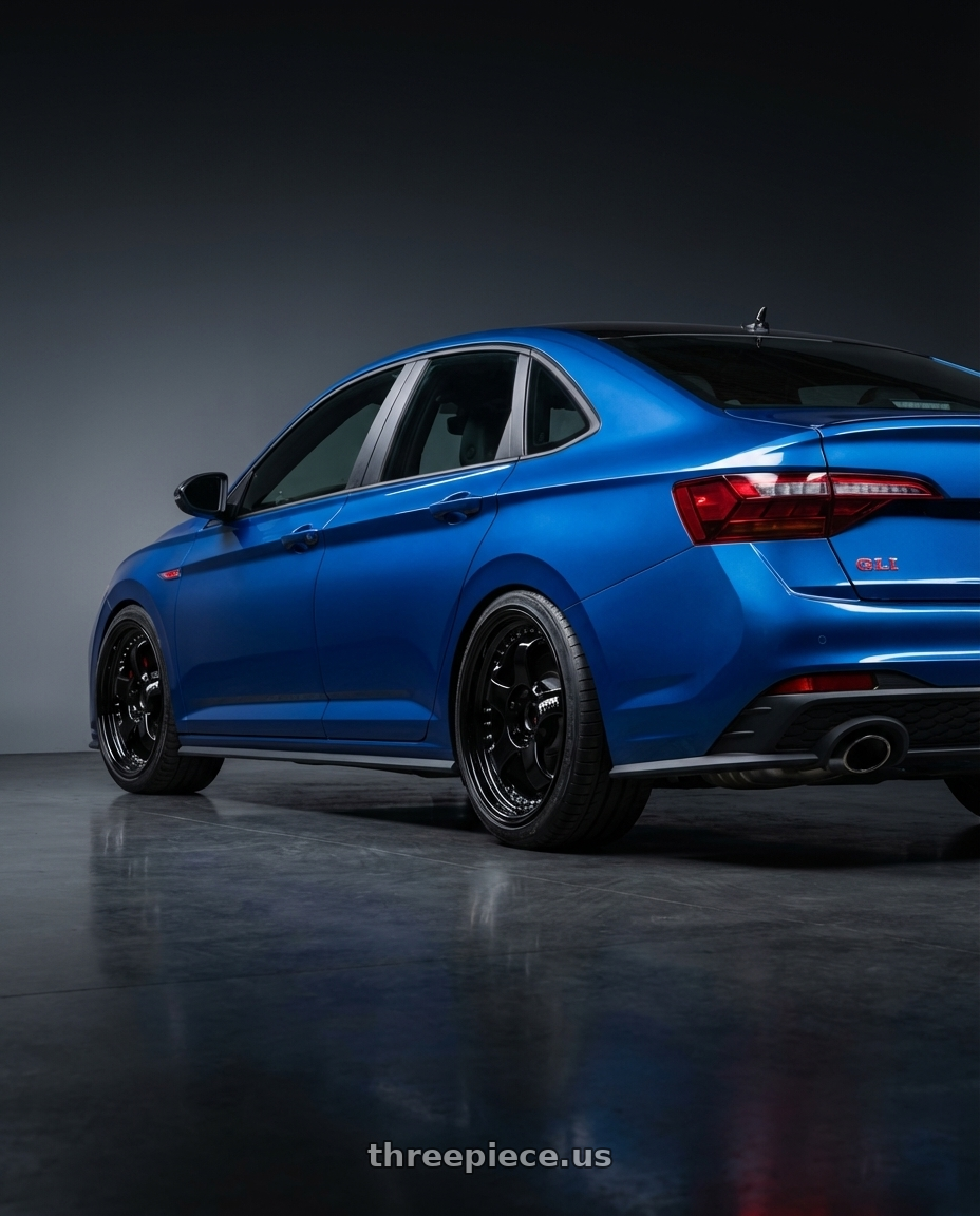 2024 Volkswagen Jetta gli blue with Work Meister S1 3P 5x100 18x9.5+41 A Disk Black wheels rear three quarter view square tires