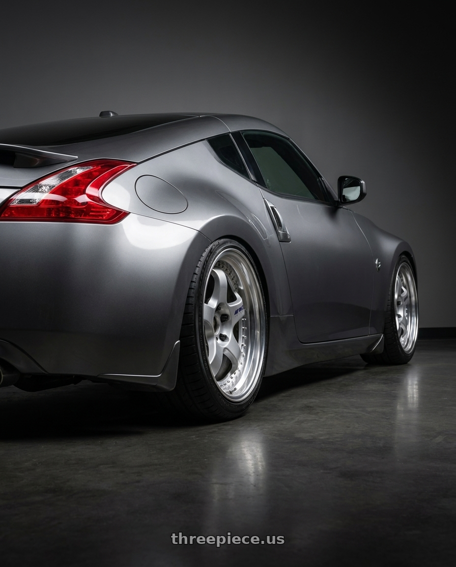 2016 Nissan 370z sport with Work Meister S1 3P 5x114.3 19x10+24 T Disk Silver wheels rear three quarter view square tires
