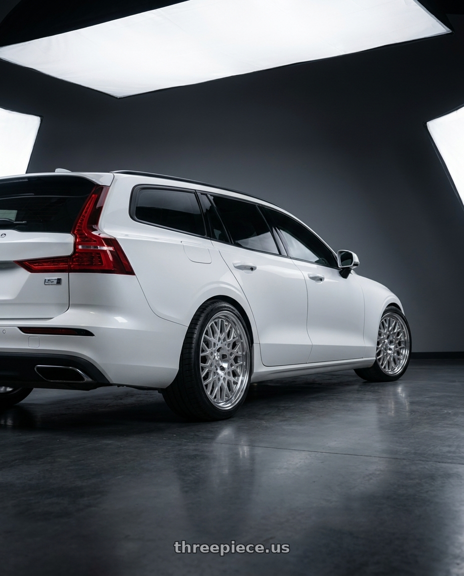 2020 Volvo V60 Momentum  with Work Seeker Cx 5x108 17x7.5+45 O Disk Matte Silver Polish wheels rear three quarter view square tires