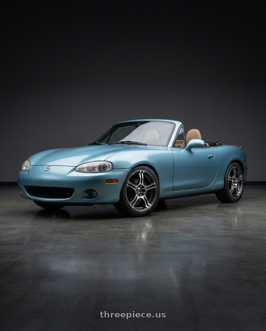 2002 Mazda Miata with Konig 48A Incident 4x100 / 4x108 14x6 +38 Graphite With Machined Face wheels