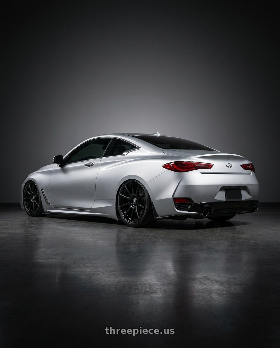 2020 Infiniti Q60 with Forgestar CF10 5x114.3 19x9 +35 Gloss Black wheels rear three quarter view slight stretch tires