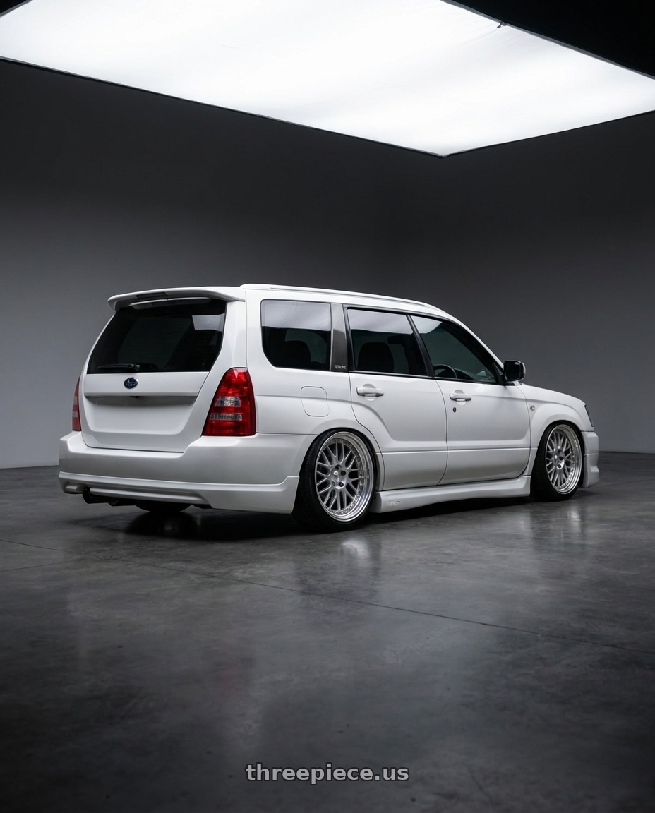 2002 subaru forester with Work Meister M1 3p 5x100 16x7+43 O Disk Silver wheels rear three quarter view slight stretch tires