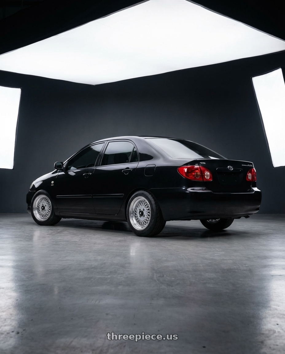 2006 Toyota Corolla Altis with Enkei Enkei92 Classic Line 4x100 15x7+38 Silver wheels rear three quarter view meaty tires