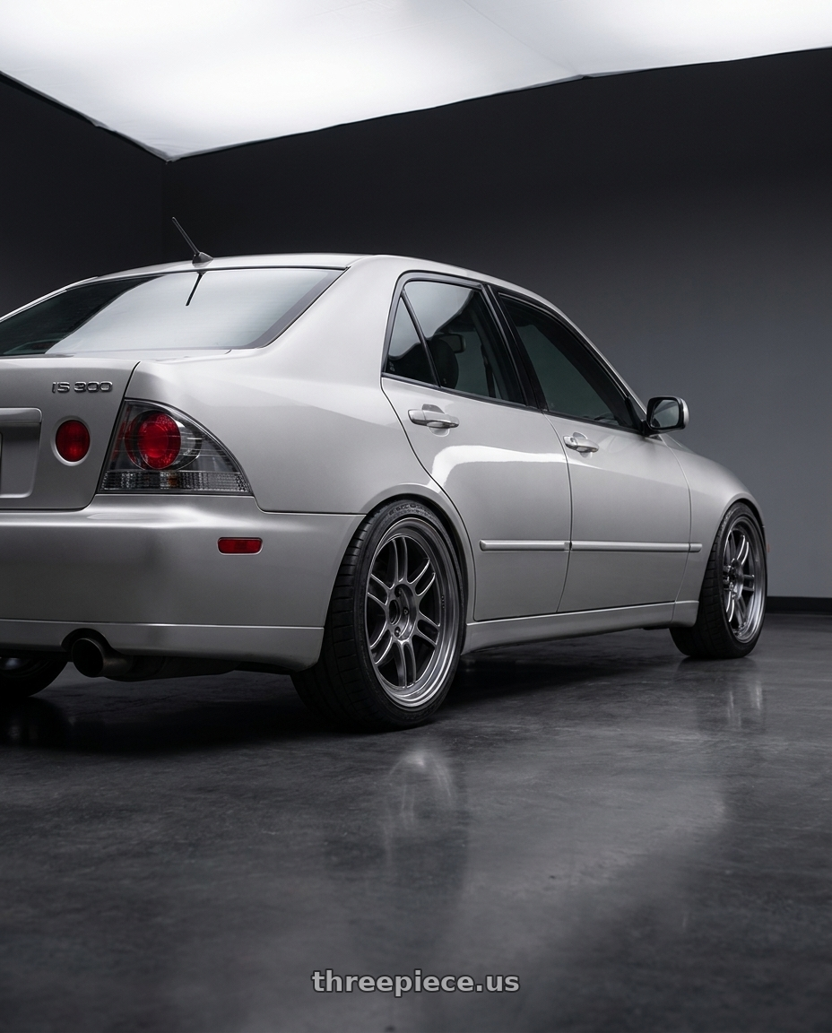 2001 Lexus IS300 with Enkei RPF1 5x114.3 17x9+45 SBC wheels rear three quarter view square tires
