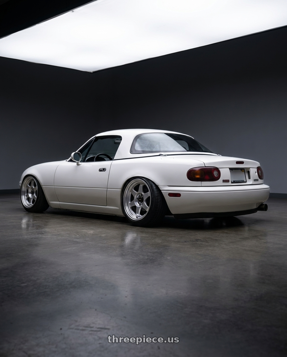 1990 Mazda miata with Vors SP1 4x100 15x7  +35 Silver Machine Face Lip wheels rear three quarter view slight stretch tires