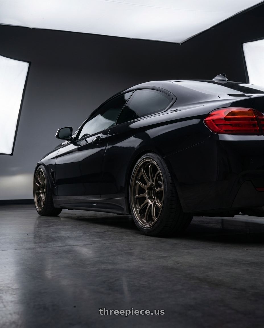 2014 BMW F32 435i with Advan Racing RS-DF Progressive 5x114.3 18x8+44 Dark Bronze Metallic wheels rear three quarter view meaty tires