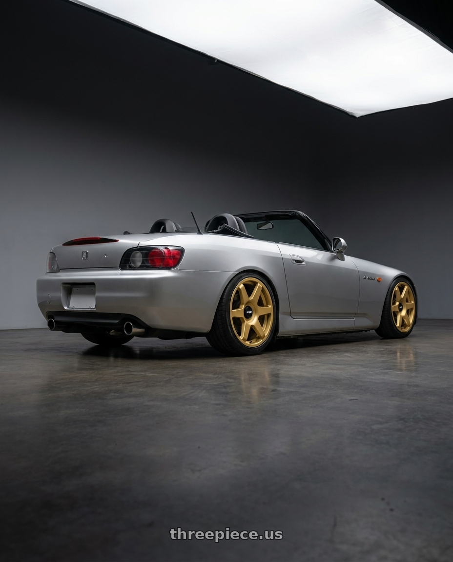2000 Honda S2000 with Rotiform 1PC R118 SIX 5X100/5X112 18X8.5 +45 MATTE GOLD wheels rear three quarter view square tires