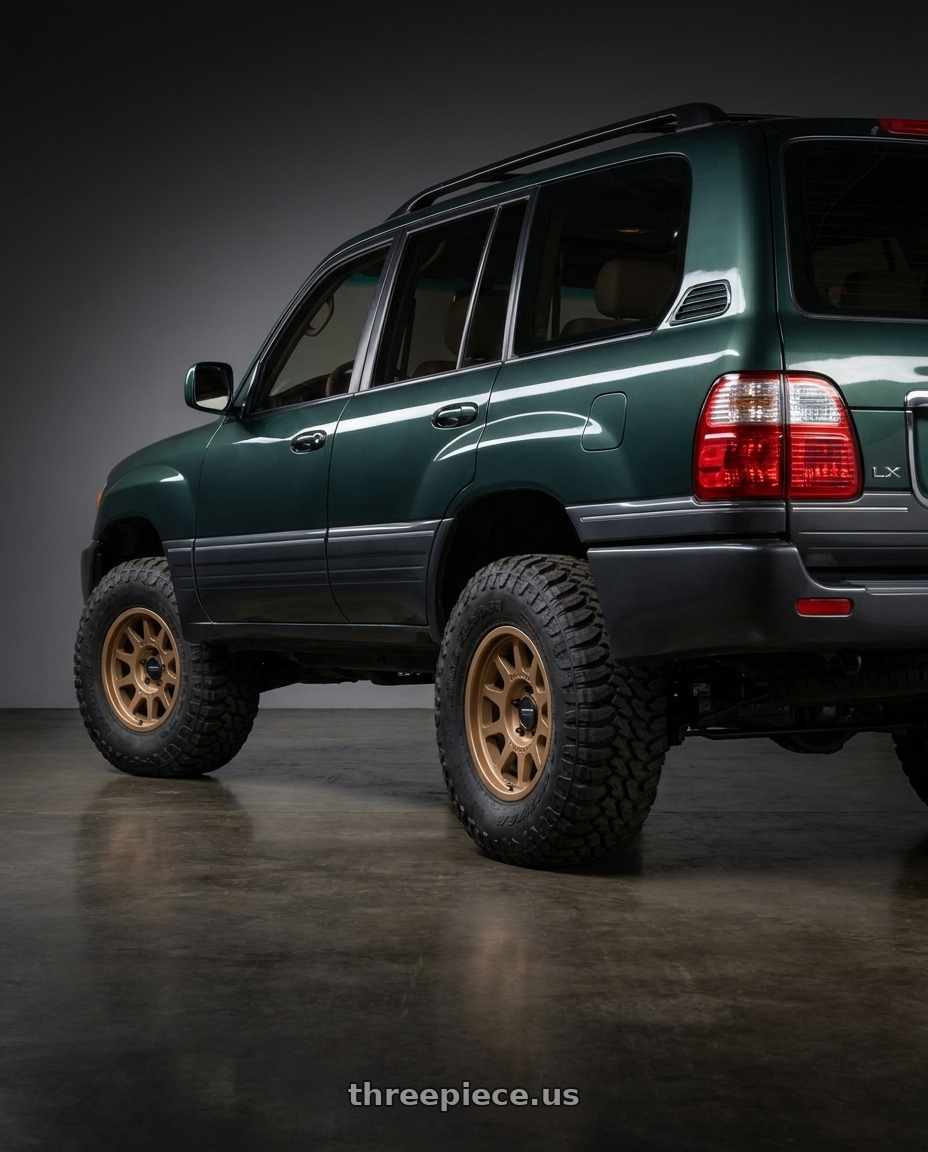 2005 Lexus lx470 with Method MR703 16x8 0mm Offset 6x5.5 106.25mm CB Method Bronze Wheel - MR70368060900 wheels rear three quarter view meaty tires