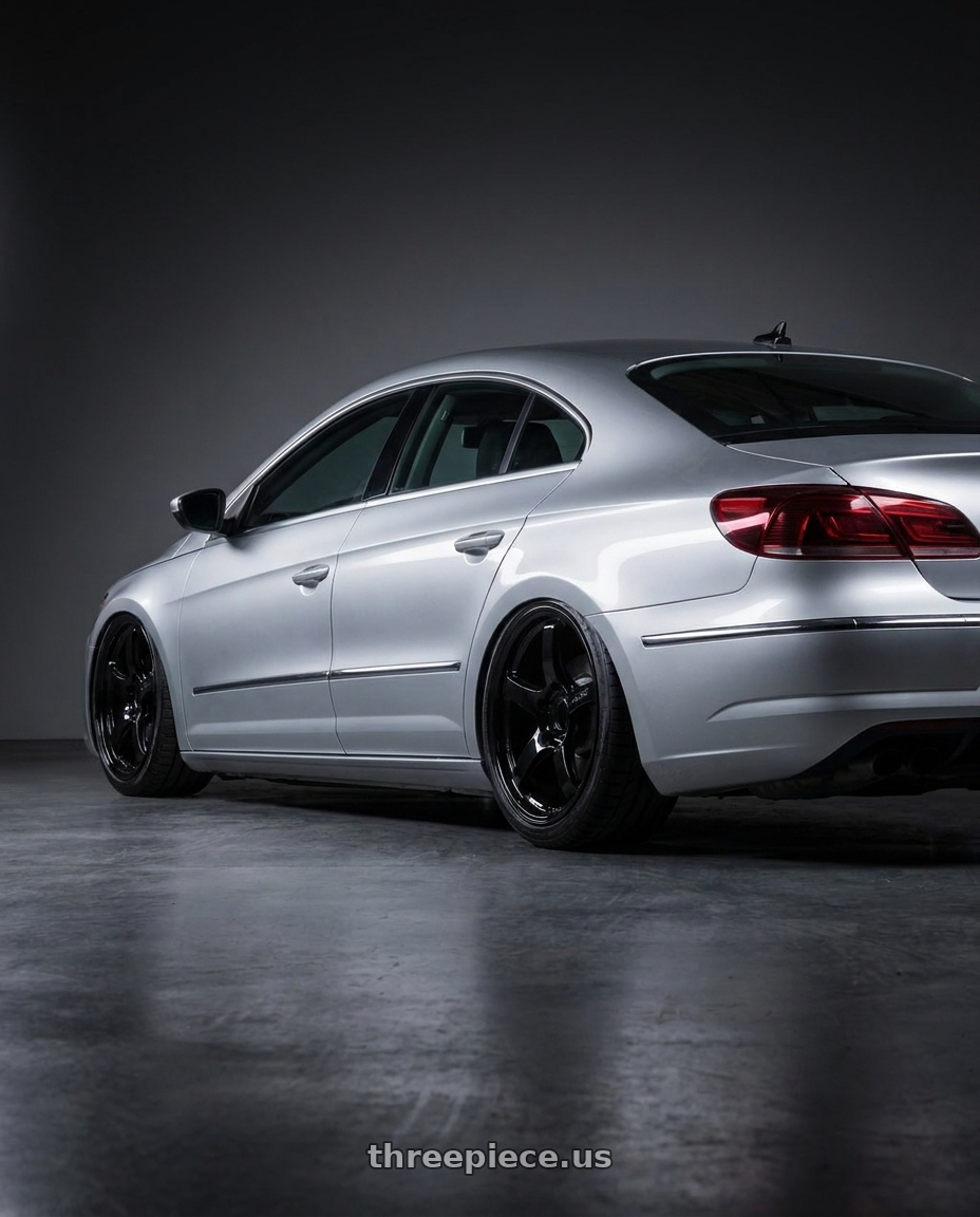2015 Volkswagen CC with Gram Lights 57CR 5x112 19x10.5+22 Glossy Black wheels rear three quarter view slight stretch tires