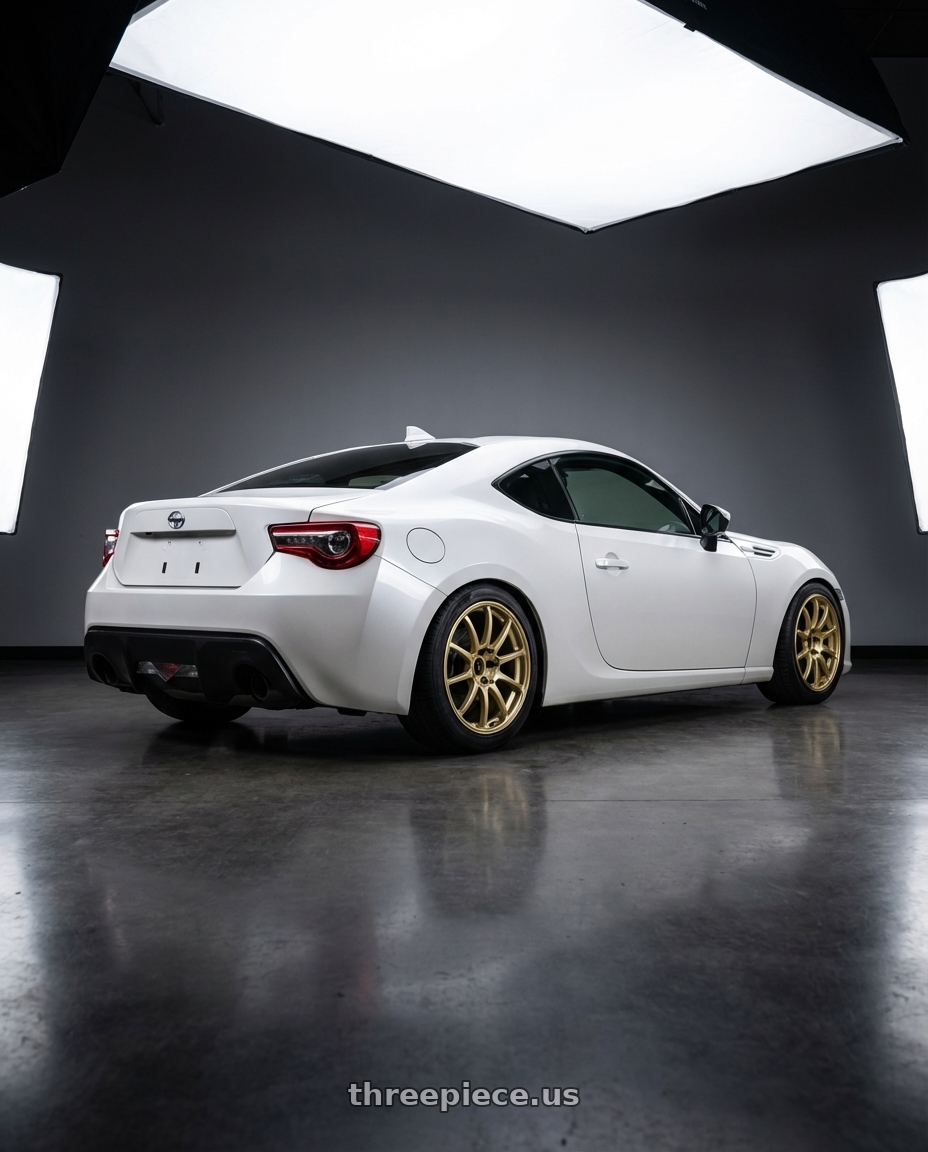 2016 Scion FR-S with Advan RCIII 5x100 17x7.5+48 Gold wheels rear three quarter view square tires