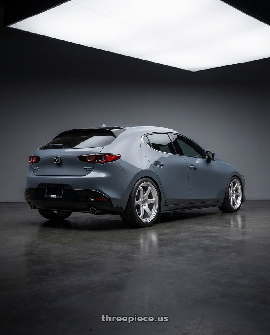 2023 Mazda Mazda3 Turbo with ESR Wheels APEX SERIES AP6 5x114.3 18x10.5 +22 Hyper Silver wheels rear three quarter view square tires