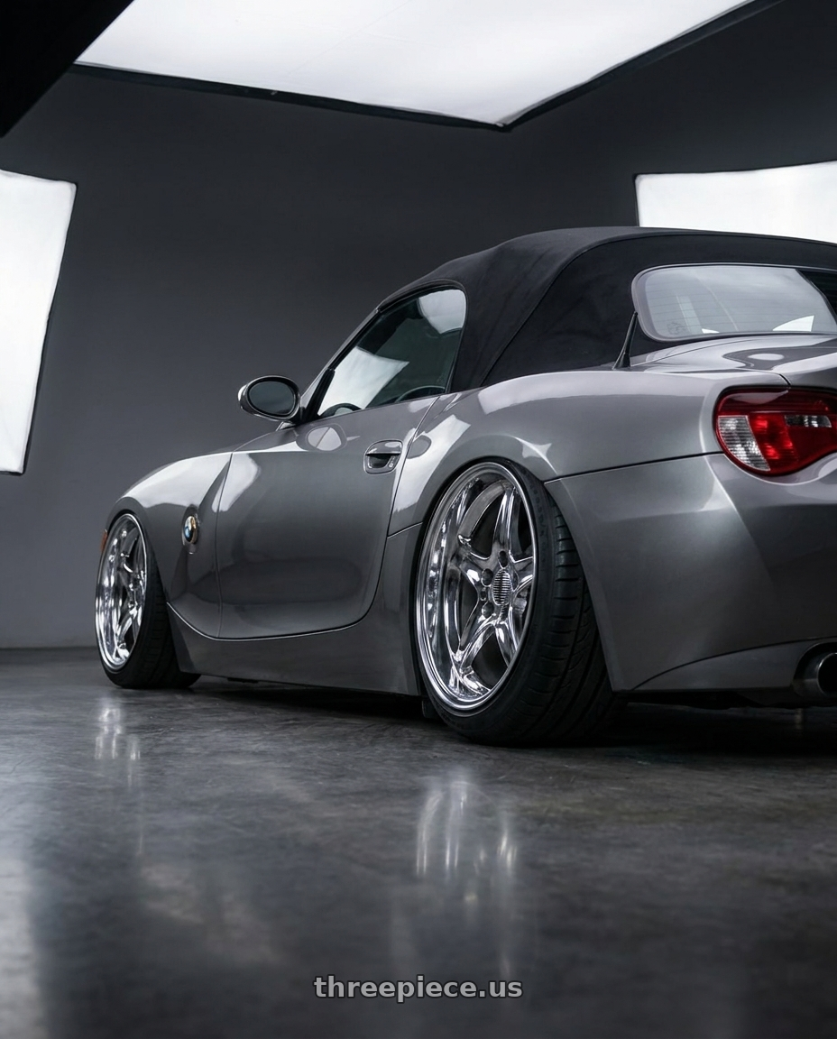 2004 BMW Z4 E85 Soft Top with Performance Replicas 102 17X9 +24 CHROME wheels rear three quarter view meaty tires